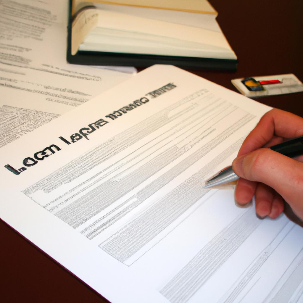 Person signing loan application form